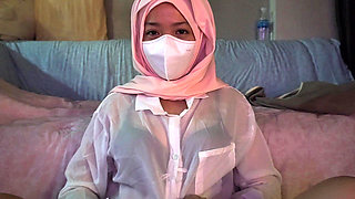 A Cute Petite Hijabi Doing Porn