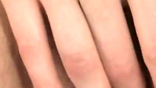 Beautiful brunette plays and masturbates with dildo