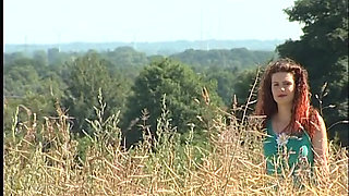 Busty redhead teen lifting dress outdoors