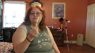 BBW nurse Vicki enjoys eatting a chocolate vanilla ice cream popsiscle