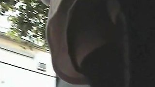 Bare pussy exposed in this upskirt voyeur cam video