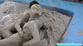 European hotties enjoy wrestling in mud