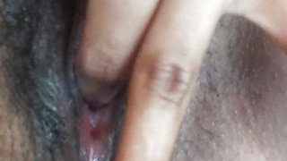 Young girl 18+ innocently fingers her wet, perfect pussy on the couch when the parents are not at home.