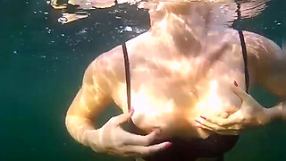 Swimming and Flashing in the Sea