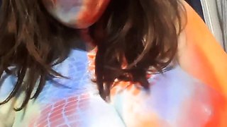 Busty curly brunette with big boobs fucks on couch