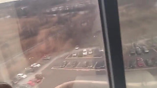 Giving Backshots While Looking Out of 12th Story Hotel